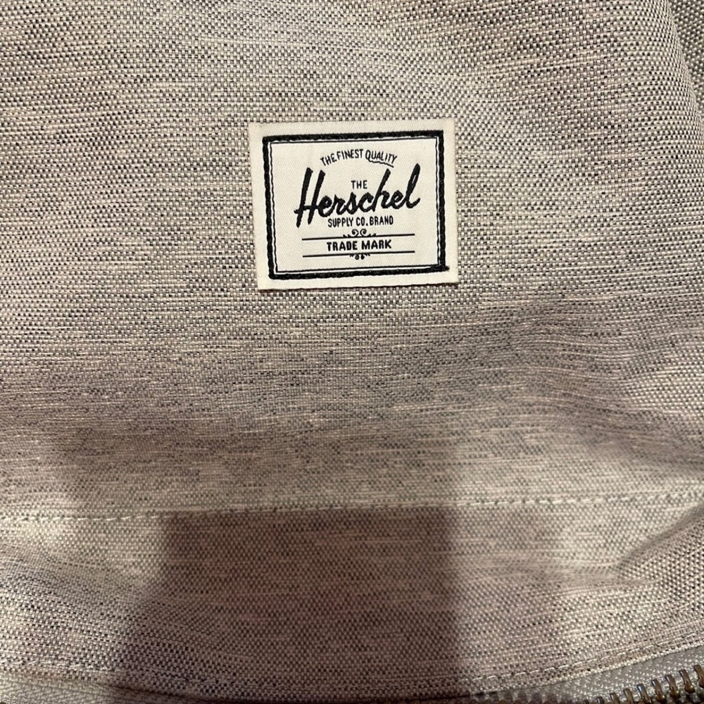 Light grey herschel book bag in great condition